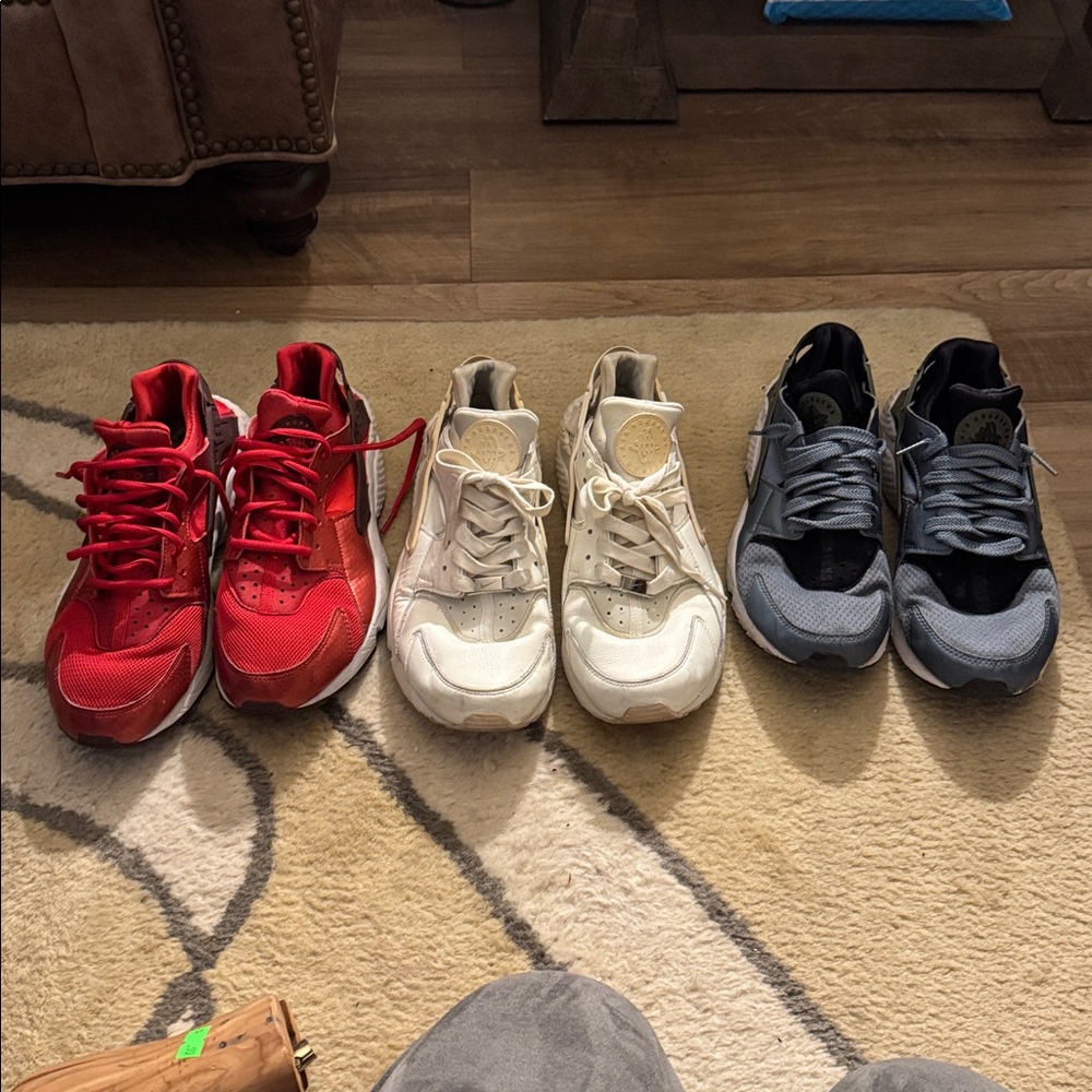 Red, gray, and white Nike Air Huarache shoes all for sale. Buy them all!